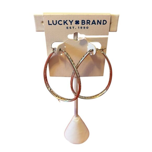 Lucky Brand Jewelry - Stenciled OpenWork Teardrop Silver Toned Hoops.